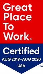 A badge with the text "Great Place To Work® Certified AUG 2019-AUG 2020 USA" in bold letters. The top part has a red background, and the bottom part with the certification details has a blue background.